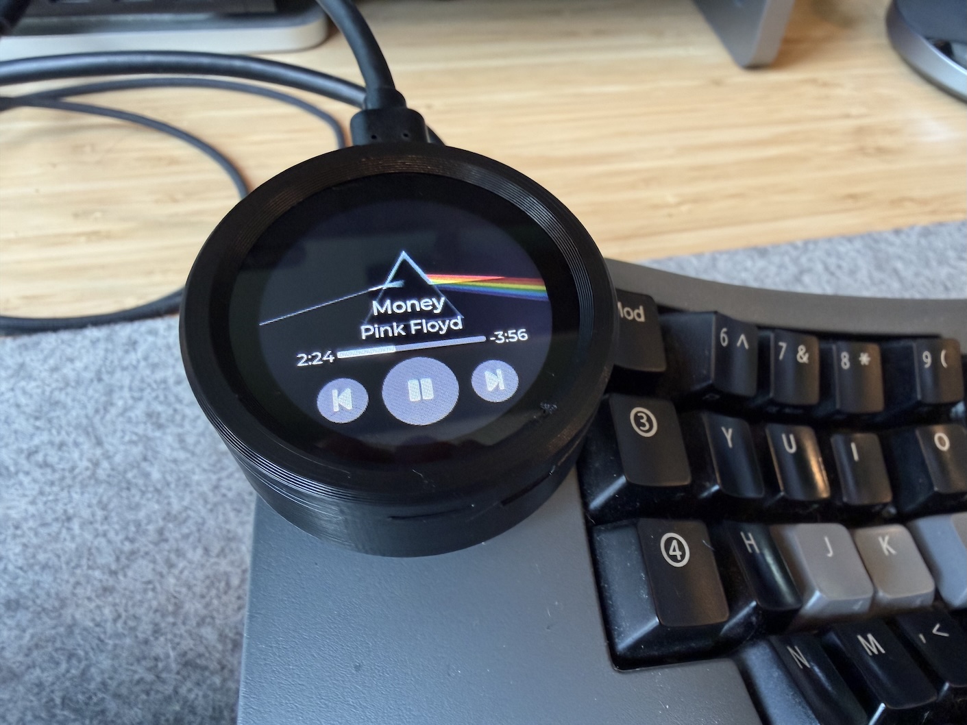 Now Playing Display device